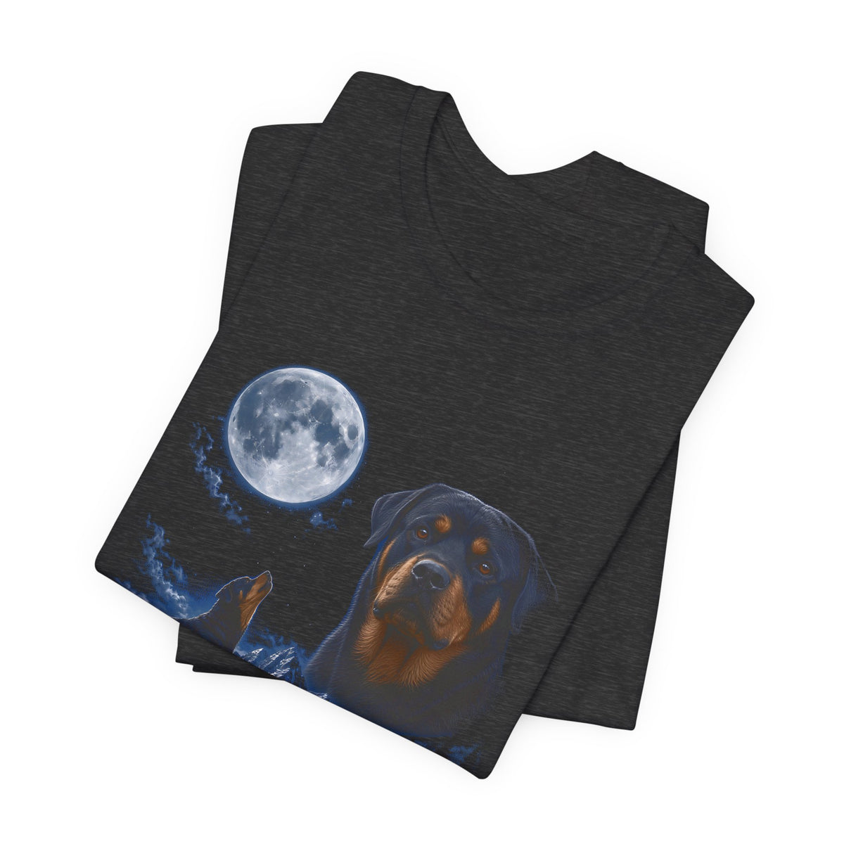 Dark Grey Heather t-shirt with a photoreal rottweiler under a full moon and a second rottweiler howling on a cliff over mountains and a waterfall, folded