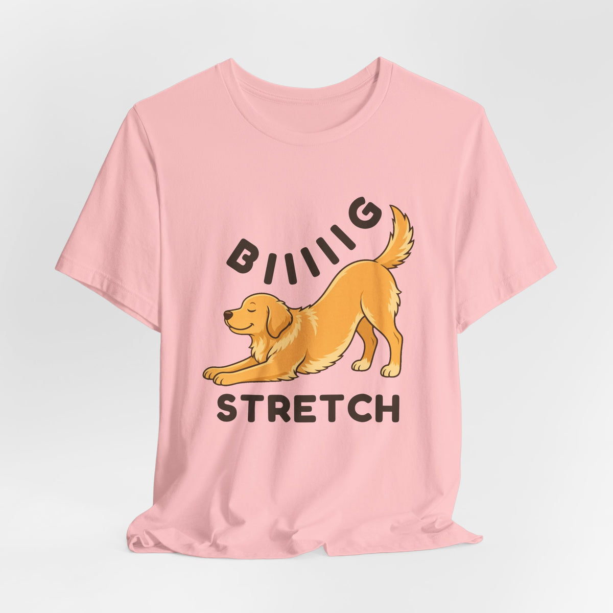 Pink t-shirt with the "Big Stretch Golden Retriever" design, flat lay
