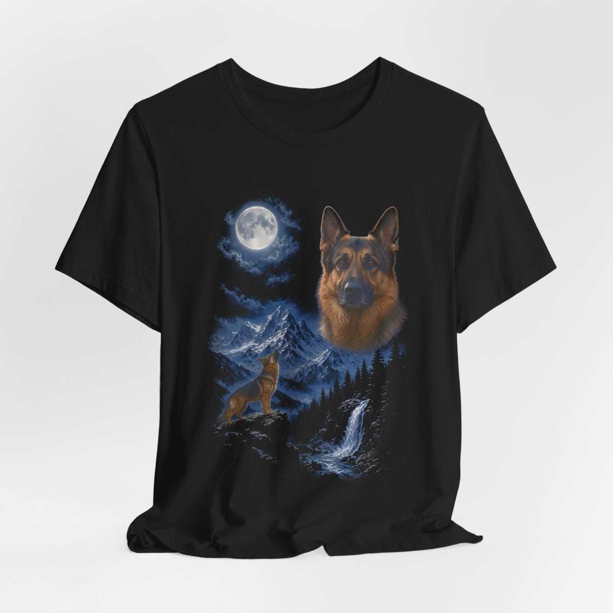 Black t-shirt with a photoreal German shepherd under a full moon and a second German shepherd howling on a cliff over mountains and a waterfall, flat lay