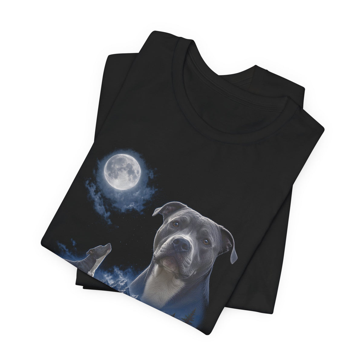 Black t-shirt with a photoreal pit bull under a full moon and a second pit bull howling on a cliff over mountains and a waterfall, folded