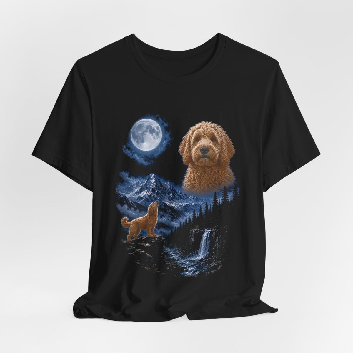 Black t-shirt with a photoreal goldendoodle under a full moon and a second goldendoodle howling on a cliff over mountains and a waterfall, flat lay