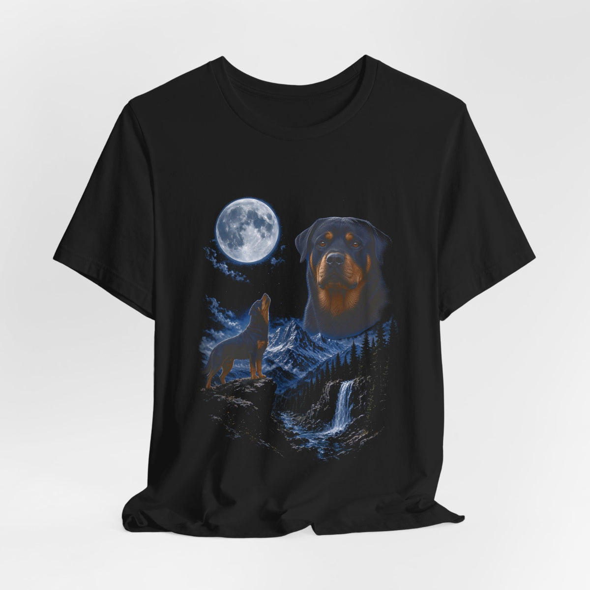 Black t-shirt with a photoreal rottweiler under a full moon and a second rottweiler howling on a cliff over mountains and a waterfall, flat lay