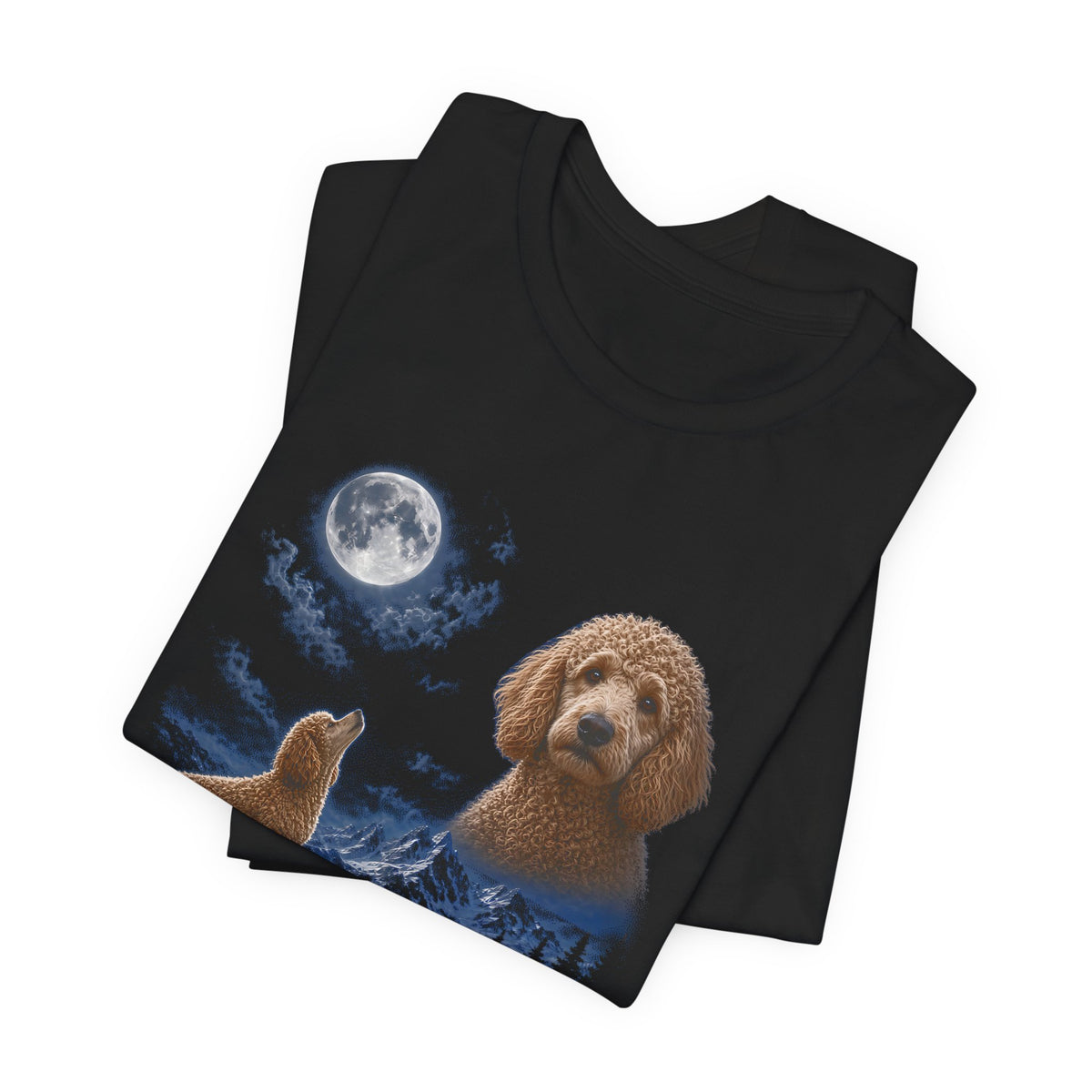 Black t-shirt with a photoreal poodle under a full moon and a second poodle howling on a cliff over mountains and a waterfall, folded